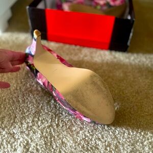 Light pink with flower print a fun shoe and comfortable